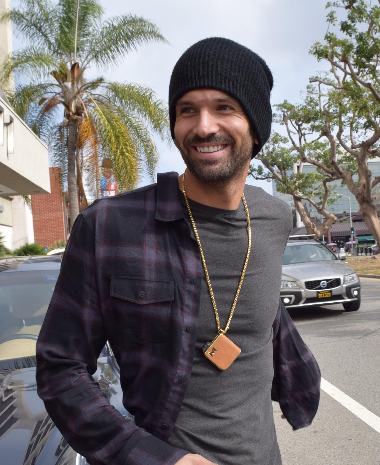 happy man with vape mod